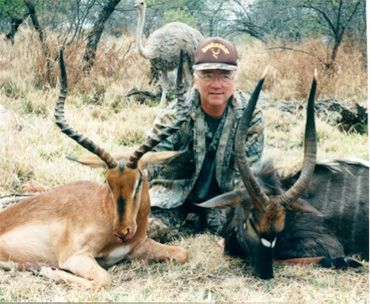 Samuel with impala and nyala