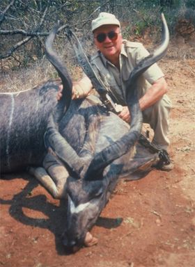 Samuel with a greater kudu